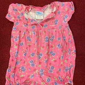OshKosh's Baby B'gosh short sleeve infant one piece. Button front; snaps bottoms
